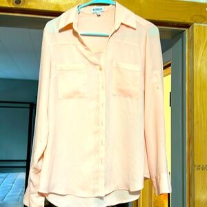 Peachy colored silky portofino shirt from express